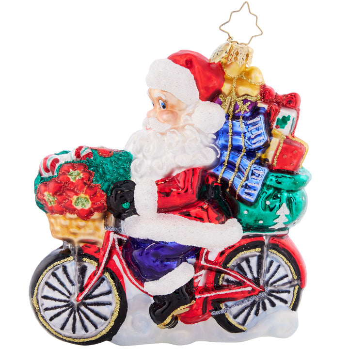 Side View 1 of 2 - Ornament Description - Santa's Ride Around Town: Cruising down the boulevard on his 10-speed, Santa is delivering perfectly-packed presents in eco-friendly style. Celebrate the cyclists in your life with this whimsical ornament!