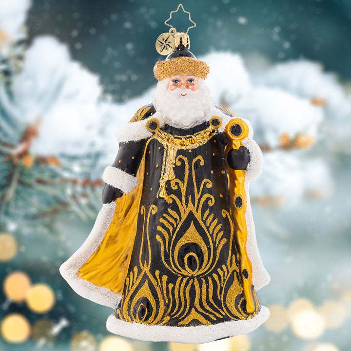 Ornament Description - Ebony Elegance Santa: A luxurious peacock design adorns this elegant Santa who enjoys the finer things in life. This fancy Santas is sure to spruce up any tree with decadent ebony and lavish gold hues!