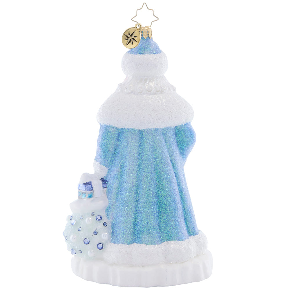 Back - Ornament Description - Frosty Father Christmas: Illuminated by an extravagant, icy blue coat and a glittered bag of gifts, this Santa shines brighter than freshly fallen snow.