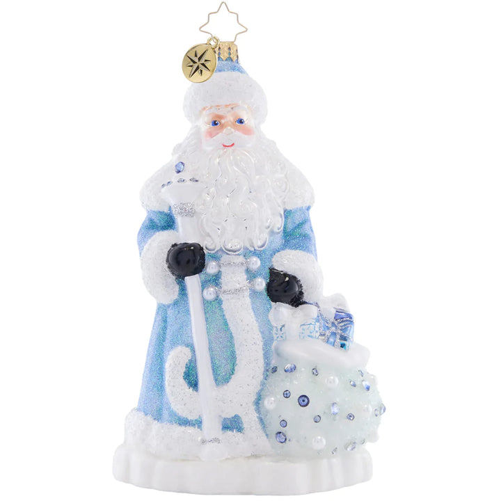 Front - Ornament Description - Frosty Father Christmas: Illuminated by an extravagant, icy blue coat and a glittered bag of gifts, this Santa shines brighter than freshly fallen snow.