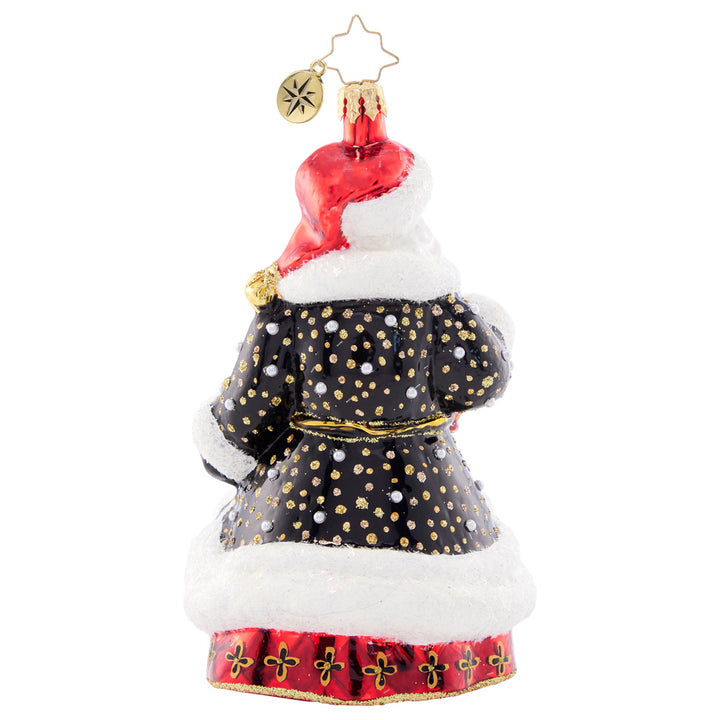 Back - Ornament Description - Golden Glow Santa: Santa's black robe is studded with silver and gold, resembling a starry sky on a cold winter night. He's got his trusty lamp to light the way this holiday season.