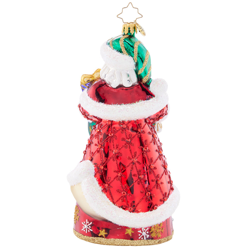 Back - Ornament Description - New Year Nice List: St. Nick spreads kindness and cheer throughout the year. Stepping into 2023 with a crimson coat adorned with golden deer!