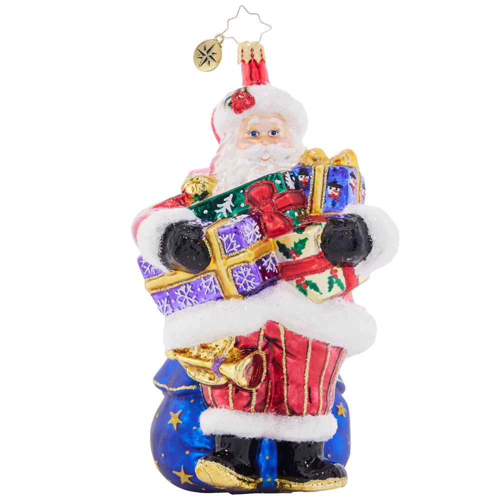 Front - Ornament Description - Carrying Christmas: As you can tell by his arms overflowing with gifts, Santa has his hands full this year! Not to worry, he'll get those gifts down the chimney in a hurry.