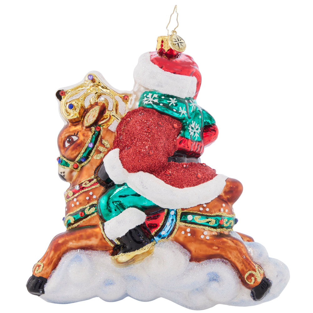 Back - Ornament Description - Giddy Up Santa: Santa is priming his reindeer for a speedy sleigh ride on Christmas Eve, so he's going out for a test run with dashing Donner! They're fiending to fly through the holiday night sky.