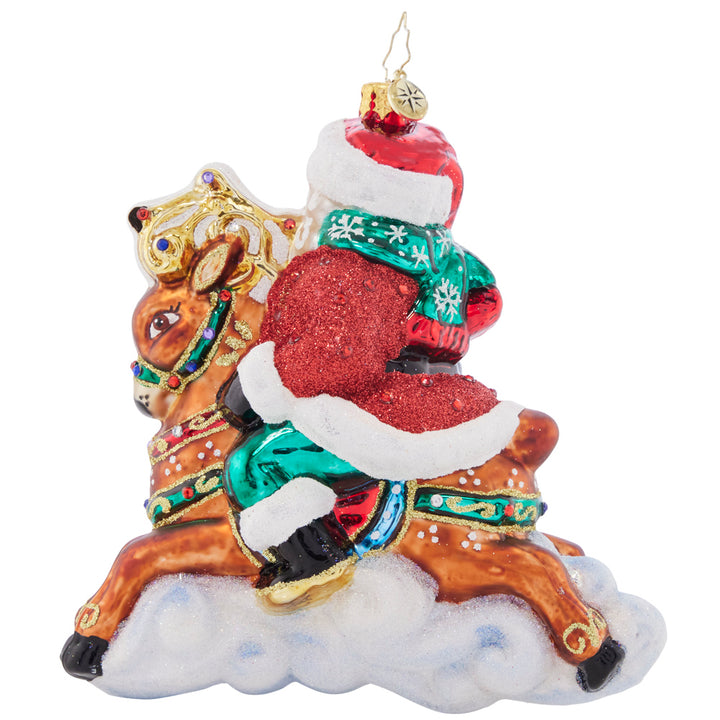 Back - Ornament Description - Giddy Up Santa: Santa is priming his reindeer for a speedy sleigh ride on Christmas Eve, so he's going out for a test run with dashing Donner! They're fiending to fly through the holiday night sky.