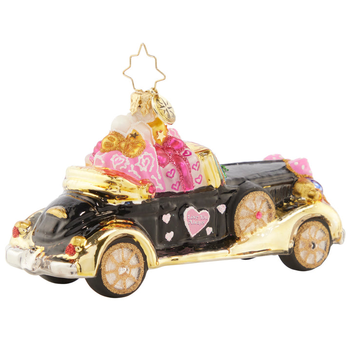 Back - Ornament Description - Just Married Roadster: If you see this heart-covered automobile driving down the road, you know what that means… A happy couple just got hitched! Honor the newlyweds in your life with this sweet ride.