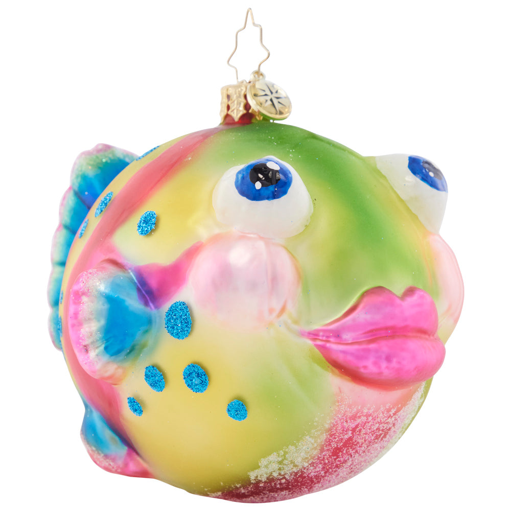 Side View - Onament Description - Playful Puffer: Pucker up, puffer fish! Painted with vibrant sorbet hues, this playful sea creature is sure to spread joy throughout the holiday season.