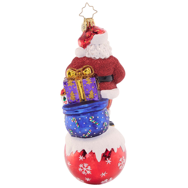 Back - Ornament Description - On Top of it Santa: With his bustling, busy holiday schedule, Santa must be on the ball when delivering his gifts. Not to worry, though, he's been doing this for a long time!