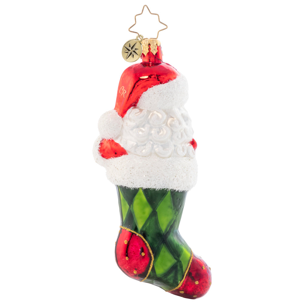 Back - Ornament Description - Stocking Stuffed Santa: Surprise! This Santa-stuffed stocking is the most perfect gift of all. Decorated with green argyle and Santa's signature jolly laugh, this ornament is sure to bring joy to your tree this year.
