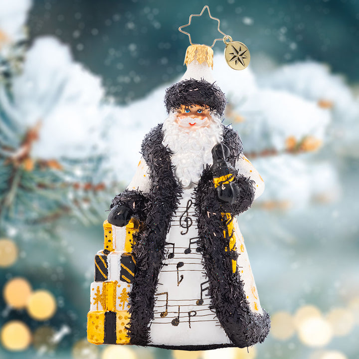 Ornament Description - Musical Merriment Santa: In a unique black-and-white coat embellished with musical notes, this sweet-sounding Santa marches to the beat of his own drum.