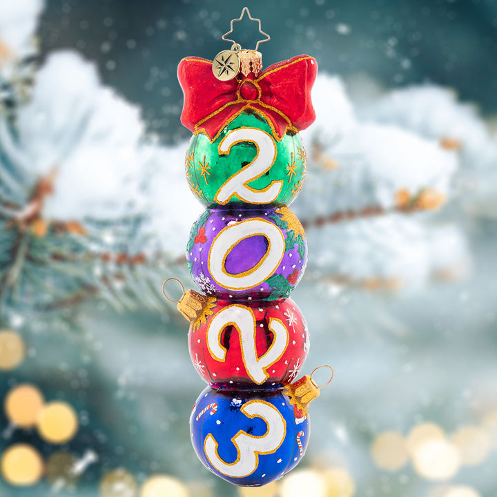 Ornament Description - Have a Ball 2023: These stacked ornament rounds are decorated with glee, spelling out the year, "2023"! Adorn your tree with this vibrant vintage-inspired piece, and celebrate another wonderful holiday season.