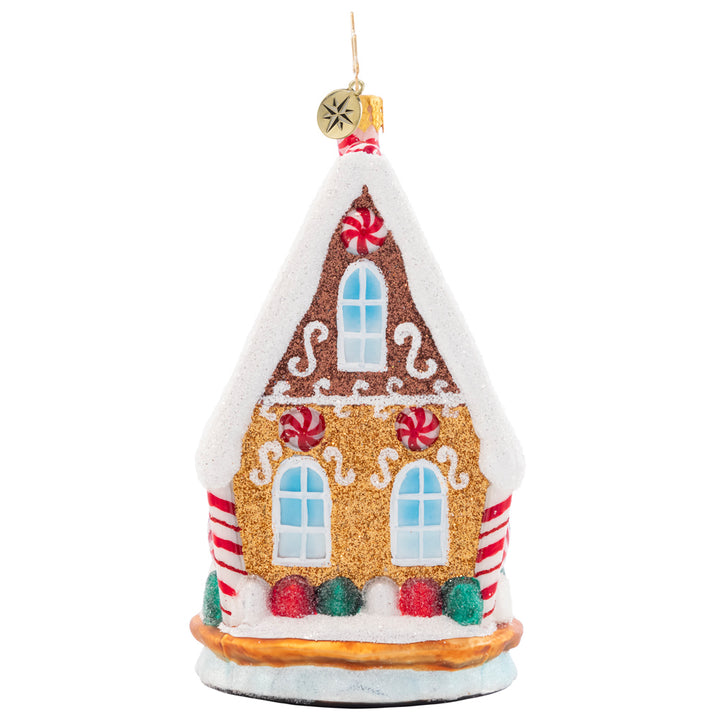 Back - Ornament Description - Sweetest Chalet: That's one cozy-looking cookie chalet! Adorned with snow made of icing, gooey gumdrops, and peppermint accents, this little house sure sweetens up the neighborhood. 