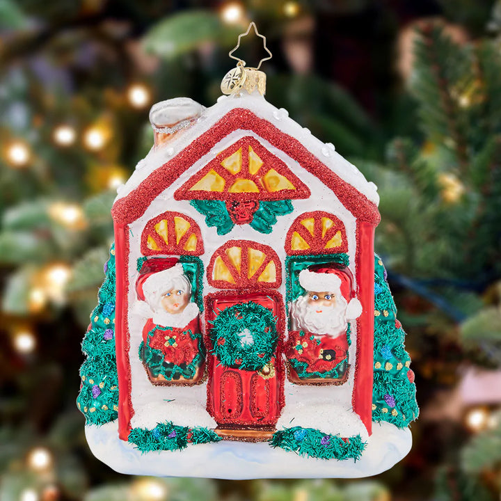 Ornament Description - Santa's Holiday Home: After a winter whirlwind of delivering Christmas gifts, Santa is ready to relax at home for the remainder of the holiday season. Him and Mrs. Claus are nice and cozy in their cheerful cottage.