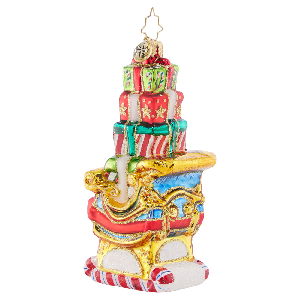 Back - Ornament Description - Piled-High Sleigh: Look at that perfectly-stacked plethora of presents! This super-stocked sleigh is ready to save Christmas day, ensuring that Santa can get all of the gifts delivered swiftly around the world.