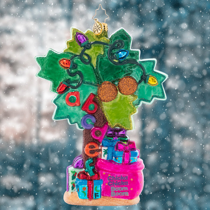 Ornament Description - Chicka Chicka Christmas: Escape the cold this season with a cool island groove and some alphabet beats! Who says that Christmas gifts can only be under an evergreen tree? This playful palm is festive, abundant, and fun- a holiday trifecta!