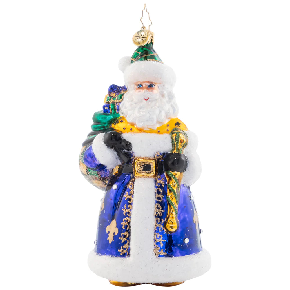 Front - Ornament Description - Lynn's Luxurious St. Nick: In a royal blue hue decorated with festive Fleur de Lis, this darling Santa is sure to bring luxurious style to your tree. Lynn Brammer gets the credit for this beautiful design!