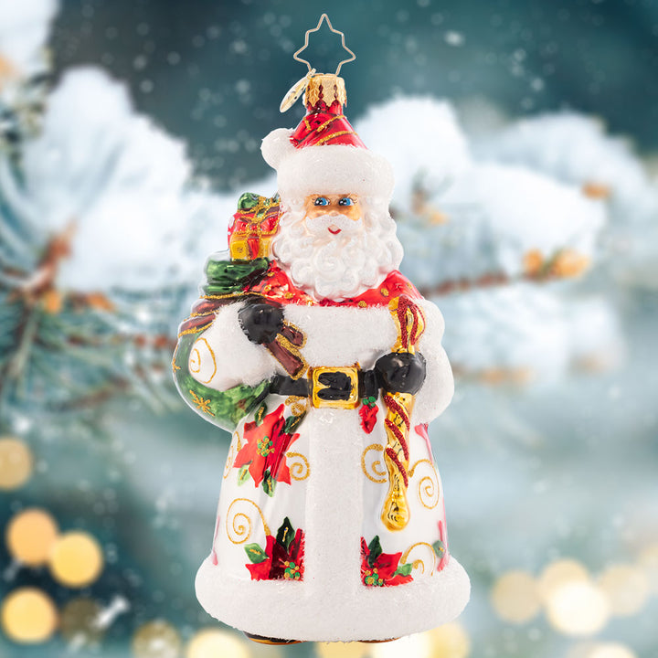 Ornament Description - Mara's Merry Claus: Poinsettias pop against Santa's sumptuous snow-white robe on this darling ornament, designed by our very own sales team member, Mara Kalnins.