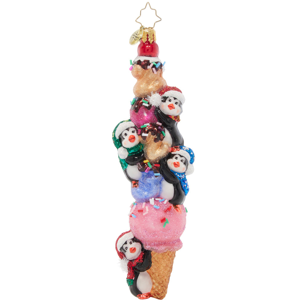 Ornament Description - 2023 Scoops: I scream, you scream, we all scream for ice cream! Four playful penguins pile atop this delectable dated cone. It looks like 2023 will be a pretty sweet year!