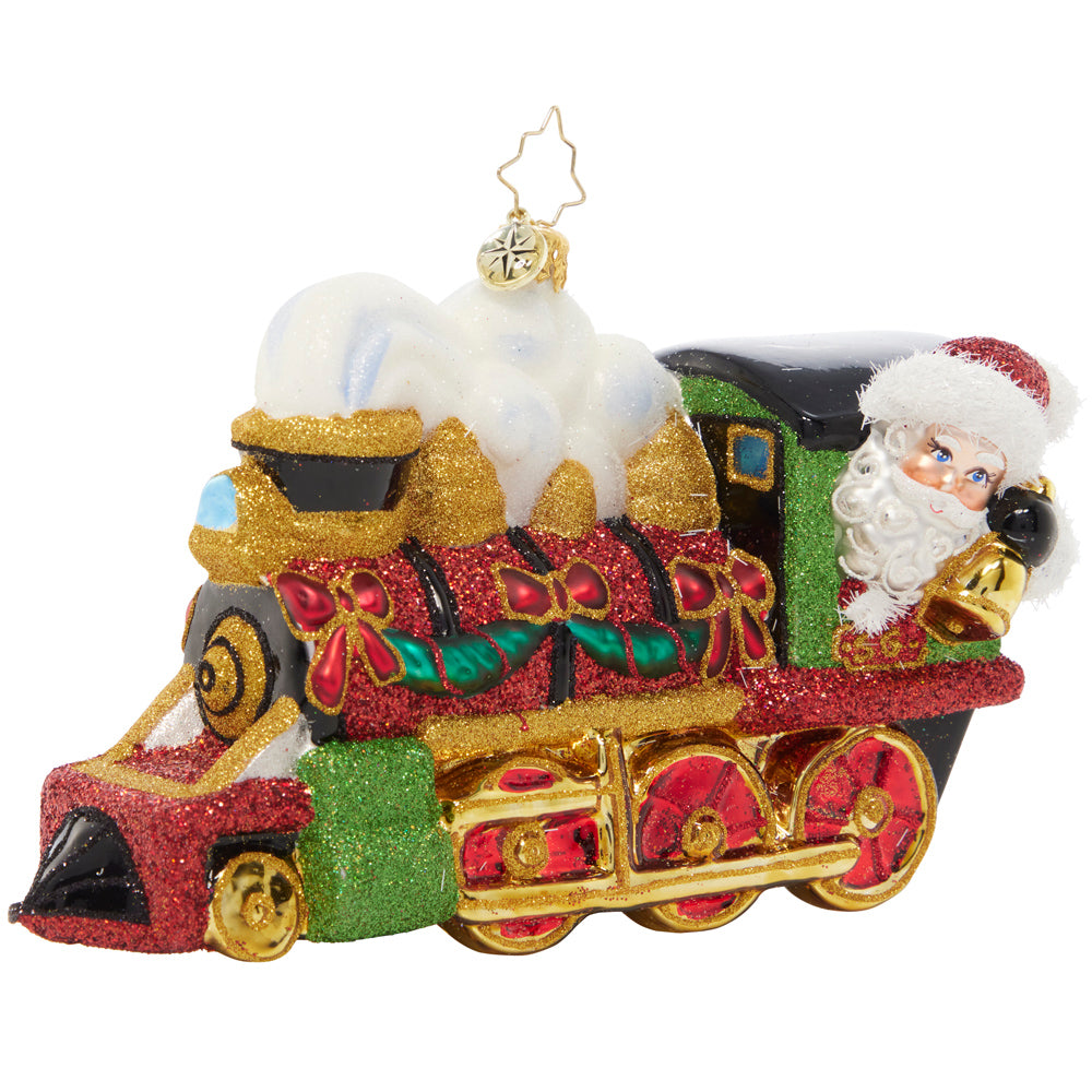 Ornament Description - Steaming Towards Christmas: Full steam ahead! Christmas is almost here and Santa has no time to waste. He's taking a speedy train to get there in haste!