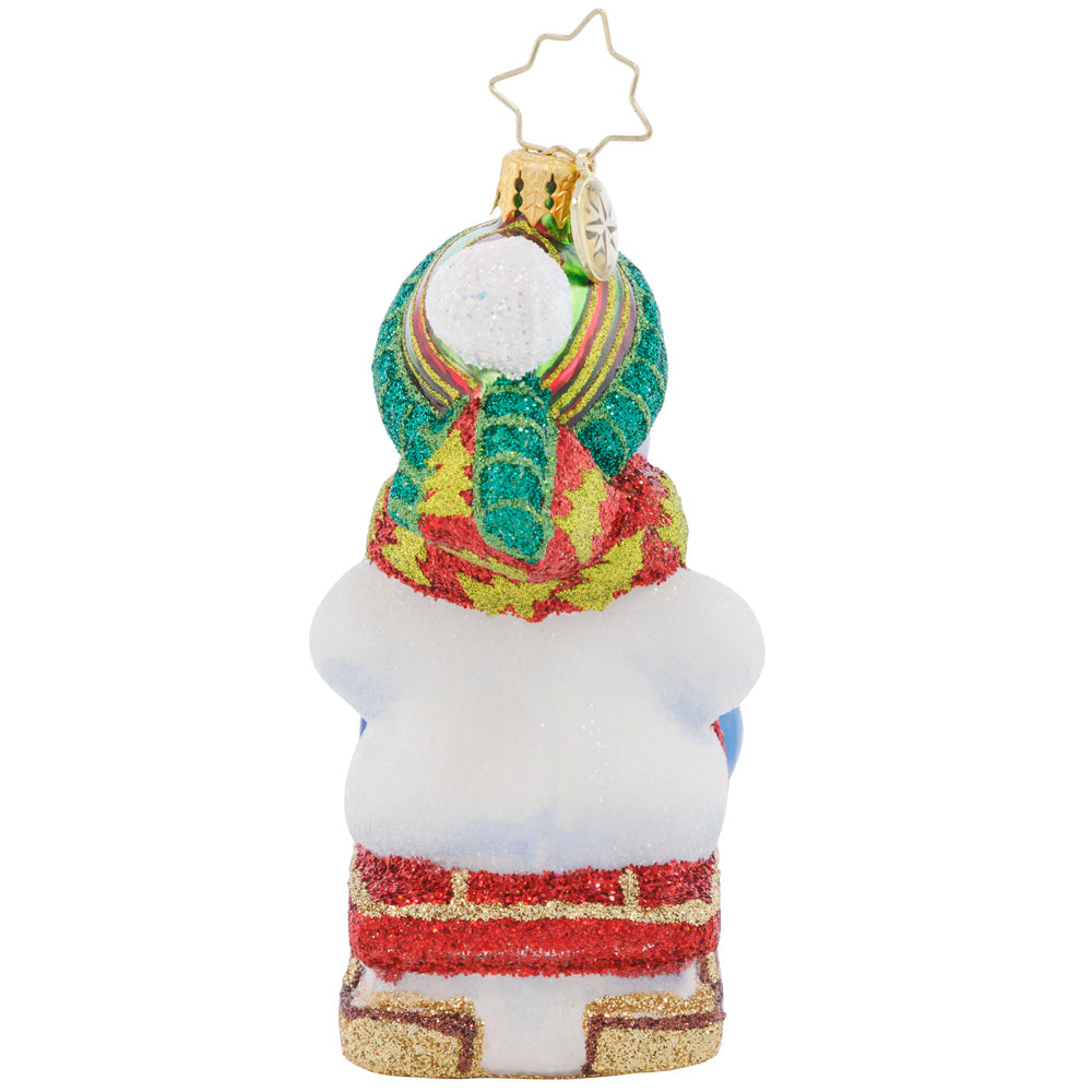 Back - Ornament Description - Sliding Through the Year: This little snowman is riding his toboggan sled into the Christmas season, looking forward to more winter fun before the holidays are all done!