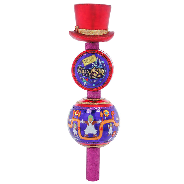 Front - Christmas Finial Description - Wonka's Golden Ticket Topper: This whimsical Willy Wonka finial is inspired by the chocolate-filled film that is beloved by many. A unique piece decorated with dancing Oompa Loompas, colorful candies, and the coveted Golden Ticket, this tasty tree topper transports us to Wonka’s world. You can just imagine little Charlie Bucket looking up his Christmas tree and seeing Wonka's hat tipped ever so jauntily, stirring up all kinds of hopes, dreams, wonder and chocolate!