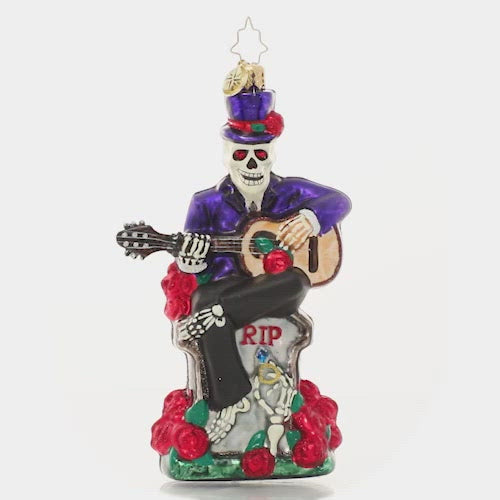 Video - Ornament Description - Love Everlasting: Proof that romance isn't dead…it's undead. A spooky skeleton serenades his beloved beyond with a haunting love song surrounded by blood red roses. This video shows the ornament spinning slowly. 