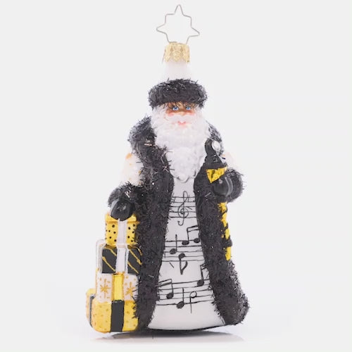 Video - Ornament Description - Musical Merriment Santa: In a unique black-and-white coat embellished with musical notes, this sweet-sounding Santa marches to the beat of his own drum. This video shows the ornament spinning slowly. 