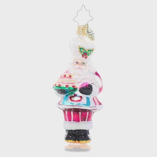 Video - Ornament Description - Santa's Tower of Flour Gem: When Santa bakes, you know it's made with love – and a little Christmas magic! He's showing off his latest sweet creation from the North Pole bakery. This video shows the ornament spinning slowly.