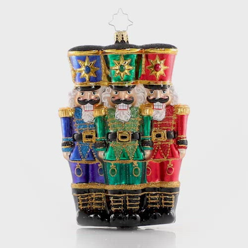 Video - Ornament Description - The Nut-Cracking Pack: These three make a real cracking team! They stand shoulder-to-shoulder in formation as they prepare for their holiday service. This video shows the ornament spinning slowly. 