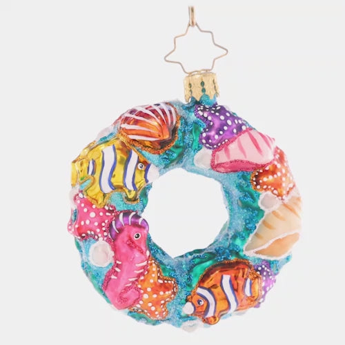 Video - Ornament Description - Under The Sea Wreath Gem: This undersea wreath is covered in colorful nautical creatures! It's the perfect little piece to add tropical touch to your tree. This video shows the ornament spinning slowly. 