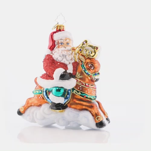 Video - Ornament Description - Giddy Up Santa: Santa is priming his reindeer for a speedy sleigh ride on Christmas Eve, so he's going out for a test run with dashing Donner! They're fiending to fly through the holiday night sky. This video shows the ornament slowly spinning. 