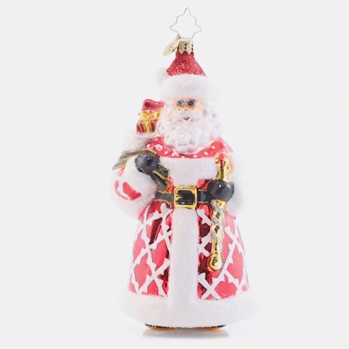 Video - Ornament Description - Jeff's Jolly Gentleman: Jolly as ever just like Jeff Clark himself, this stylish Santa ornament is stunning in a crimson patterned coat. This video shows the ornament slowly spinning. 