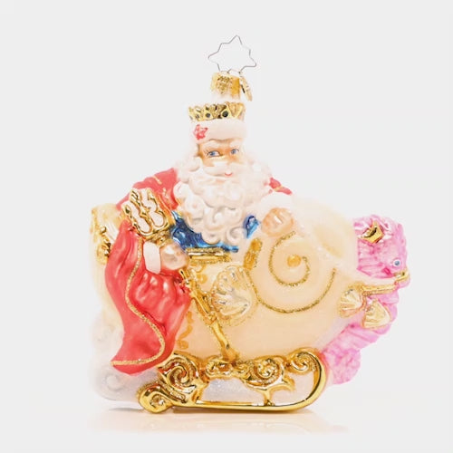 Video - Ornament Description - Sea King Santa: Toting a magnificent trident, this nautical Santa rides in a shell sleigh pulled by his seahorse stallion. Decorated as can be, king of the sea! This video shows the ornament spinning slowly. 