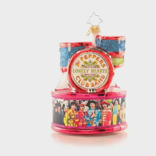 Video - Ornament Description - The Beat of Their Own Drum: The Fab Four are ready to Rock Around the Christmas Tree. All that is missing is their Little Drummer Boy, Ringo! This video shows the ornament spinning slowly. 