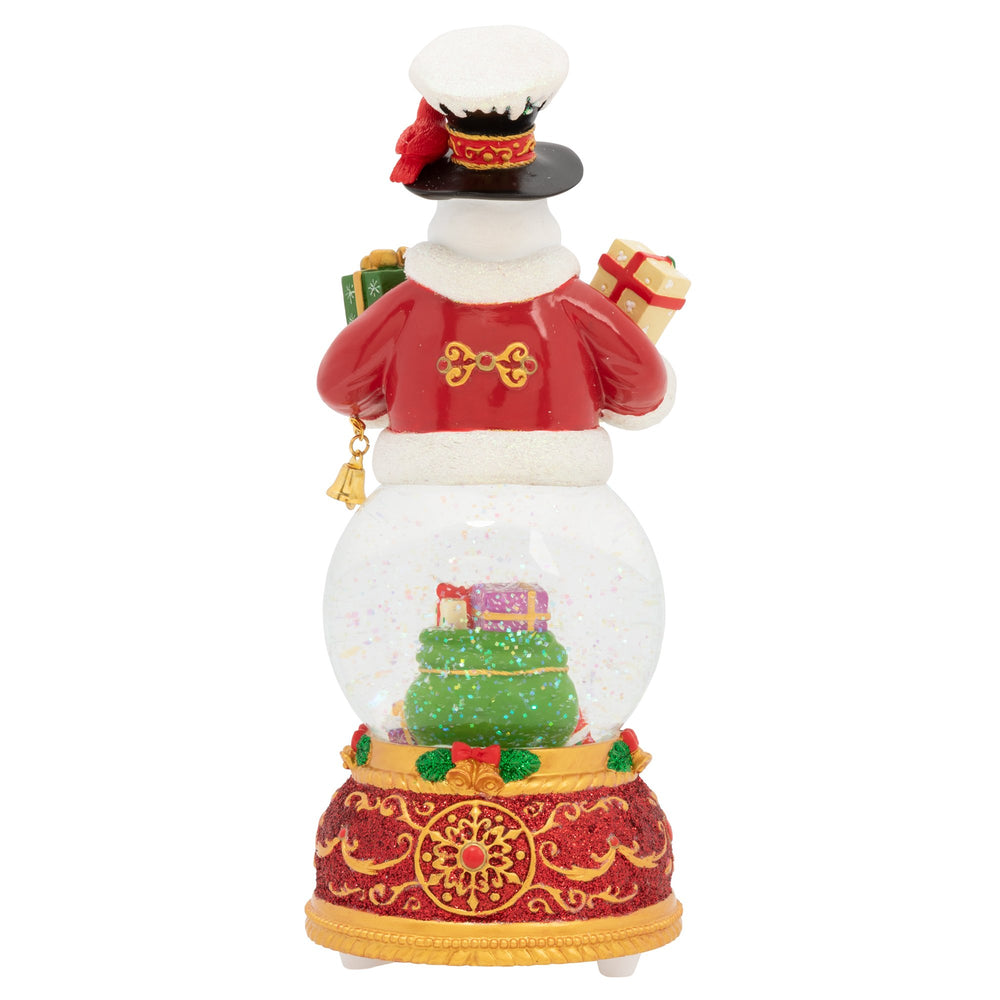 Back - Snowglobe Description - Snowy Tidings: Our frosty friend is always dreaming of a white Christmas. And this year, his wishes have all come true! The whole town is covered in a blanket of fresh, powdery snow. Enjoy this scenic snowglobe and sing along as it plays the classic holiday tune, "Let It Snow."