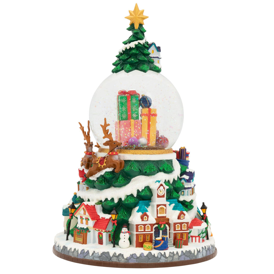 Back - Snow Globe Description - All Through The Night: Santa and his reindeer have quite the night ahead! They've got an endless stream of presents to deliver, while all the children sleep soundly in their beds. Enjoy the magic of the season with this stunning snowglobe that plays the classic holiday song, "Oh, Christmas Tree."