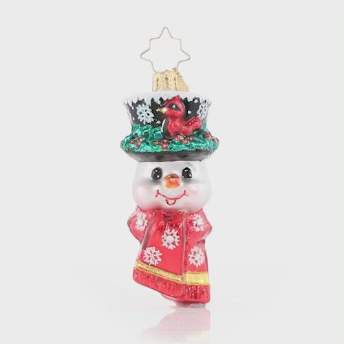 Video - Ornament Description - A Snowman Worth Flocking to Gem: This jolly little snowman has made a feathered friend! A cheerful red cardinal has made himself right at home in Frosty's cap.