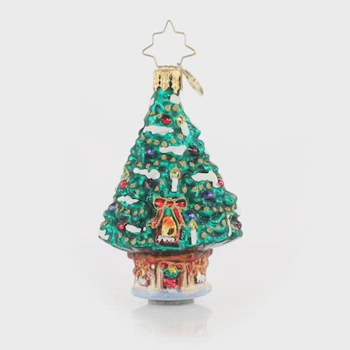Video - Ornament Description - World's Best Treehouse! Gem: Oh Christmas tree, oh Christmas tree... This delightful little dwelling is fit for holiday royalty! This video shows the ornament spinning slowly. 