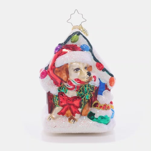 Video - Ornament Description - Happy Howl-idays: Decked out with Christmas lights and a bone-laden wreath, this dog house is as cozy as can be! This video shows the ornament slowly spinning. 
