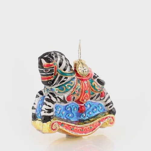 Video - Ornament Description - Rocking In Stripes Gem: Black with white stripes, or white with black stripes? Whatever side you are on, it is clear this beauty is more than your average rocking horse! This video shows the ornament spinning slowly. 