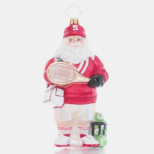 Video - Ornament Description - Tennis Ace Santa: Game, set, match! Santa grabs his gear and preps to warm up for the big North Pole tennis tournament. Go Santa! This video shows the ornament spinning slowly.