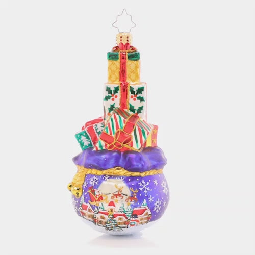 Video - Ornament Description - Gift Delivery: This tower of good tidings is full to the brim with Christmas presents. Looks like there were lots of good little girls and boys on the nice list this year!