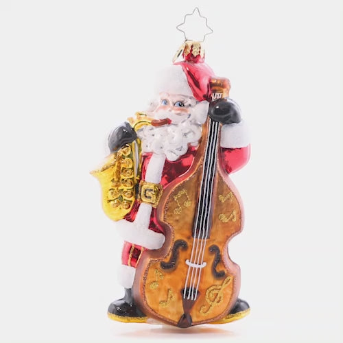 Video - Ornament Description - Merry Music Maker: Holding a saxophone and a standing bass, this Santa sure is extra jazzy! Adorn your tree with this whimsical piece and celebrate the songs of the holiday season. This video shows the ornament spinning slowly. 