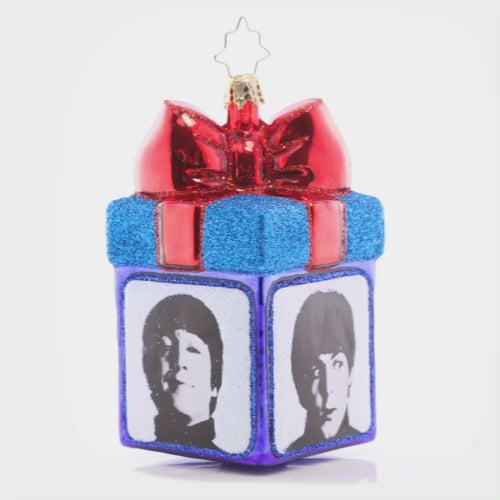 Video - Ornament Description - Gather 'Round for Gifting: George, Ringo, John, or Paul? You don't have to choose- the gang's all here to ring in the holidays with you! What surprise gift could they have brought you? Whatever it is, the best gift of all is the iconic music of the Beatles. This video shows the ornament slowly spinning.
