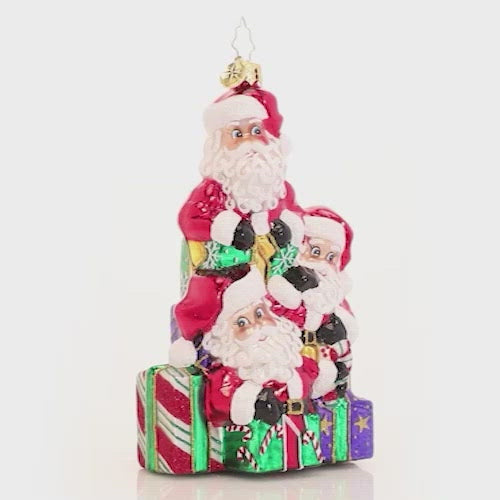 Video - Ornament Description - A Tremendous Trio of Santas: Good things come in threes! It is not easy to get all the way around the world in a single night, so Santa used a little Christmas magic to clone himself a few extra pairs of hands this year.
