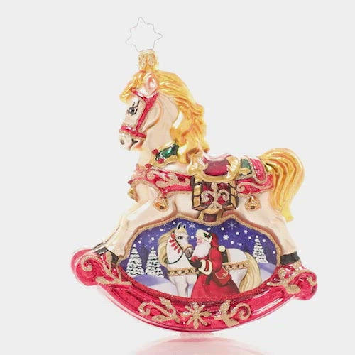 Video - Ornament Description - Resplendent Rocking Horse: Shining in holiday colors of rich red, bright gold, emerald green and midnight blue, this ornate rocking horse embodies timeless Christmas tradition. The wintry vignette beneath reveals a sweet moment between Santa and his noble steed. This video shows the ornament spinning slowly. 