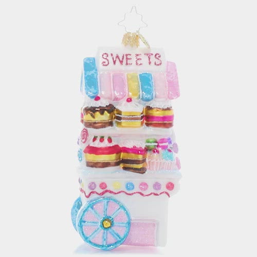 Video - Ornament Description - Sweets For Sale: It's the best time of the year – the holiday candy cart is open for business! Satisfy your sweet tooth with one of the tasty treats for sale, or get in the spirit of giving and share with a friend. This video shows the ornament spinning slowly. 