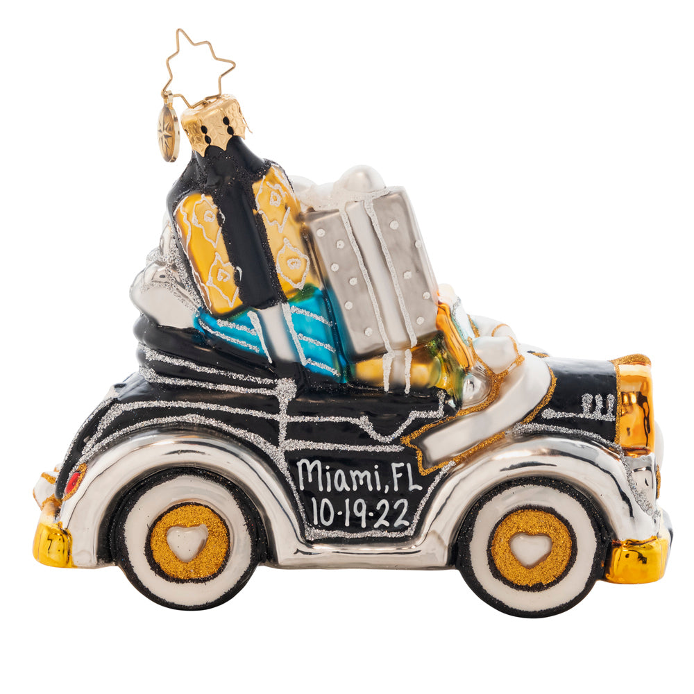 Side View - Ornament Description - Gifts On The Way: Getting hitched? This 2018 gorgeously gift-filled convertible is just waiting for you and your loved one to put your names on it! The adorable front license plate is dated 2018. Note: Please allow approximately one month (on top of shipping time) for our elves to personalize your ornament.