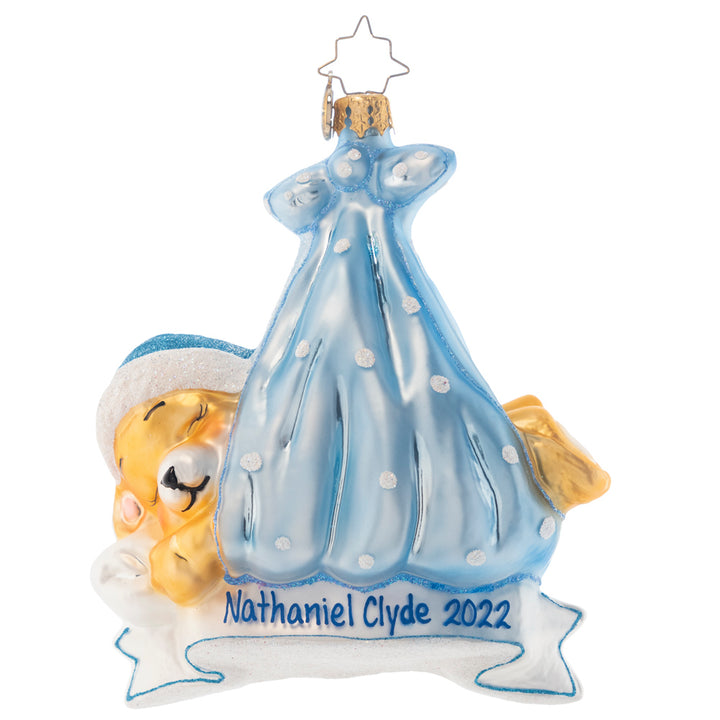 Ornament Description - Special Delivery Boy: Straight from the stork's beak, this charming baby bear rests peacefully in his sling of sky blue cloth. Add the name of your newest arrival on the banner to create a truly wonderful family heirloom. Note: Please allow approximately one month (on top of shipping time) for our elves to personalize your ornament.
