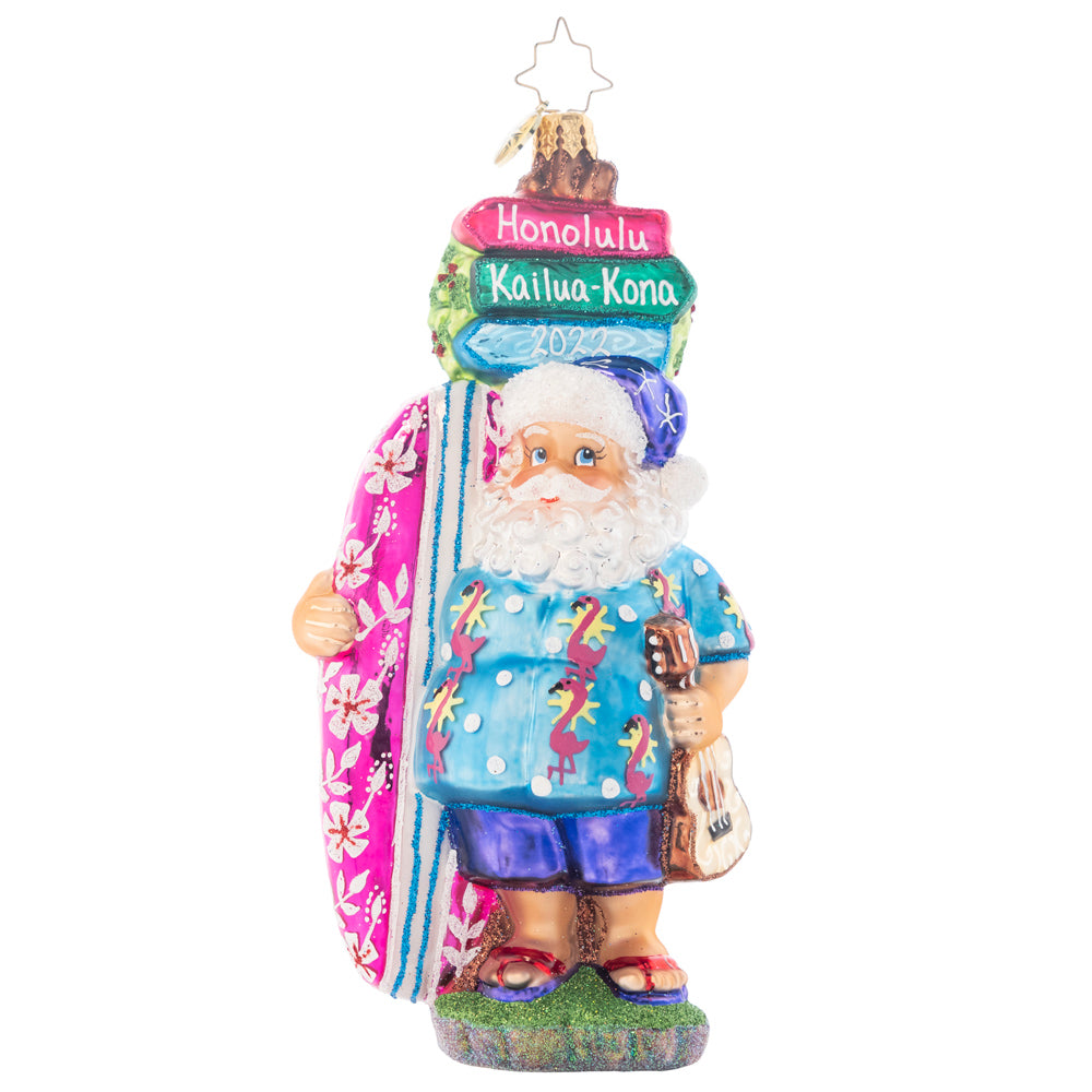 Ornament Description - Aloha Santa!: Flamingo pink is a new color theme for Santa! Bring the tropics to your tree with this ukulele playing, pink surfboard riding, ocean themed, Hawaiian vacation mode St. Nick! Note: Please allow approximately one month (on top of shipping time) for our elves to personalize your ornament.